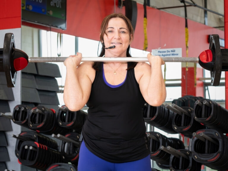 lizzie gym floor manager at westpark lifting weights