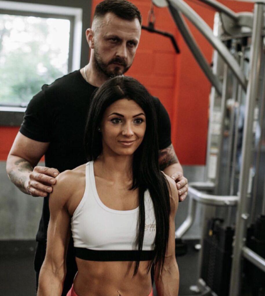 become a sponsored athlete in dublin 24 brigi german posing on stage at a bikini fitness event