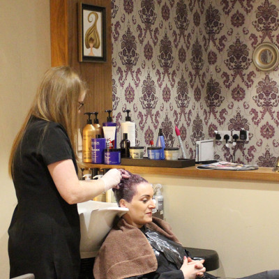 woman getting a hair cut