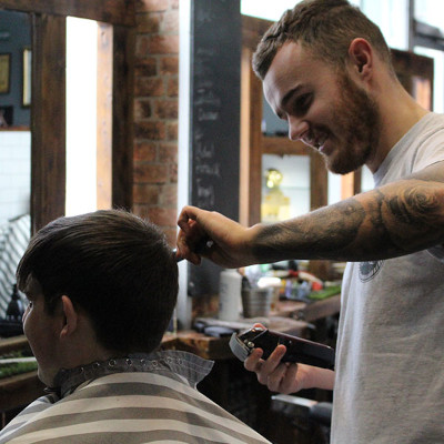 boy getting a hair cut