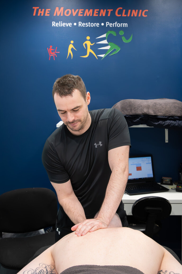 person getting physical therapy at the movement clinic in westpark fitness