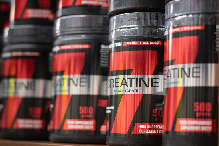 creatine supplements on a shelf