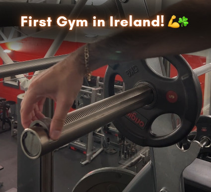 origin fitness barbell on gym floor